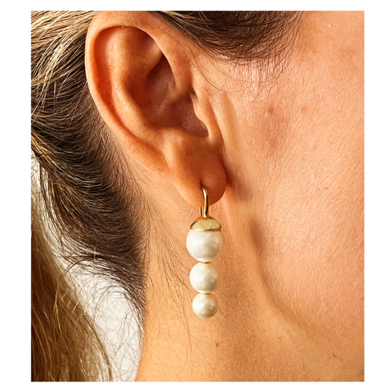 Model with Pretty Pea Pod Pearls, Creamy White earrings 
