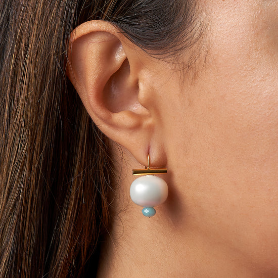 model with Sky Pebble Dot earring