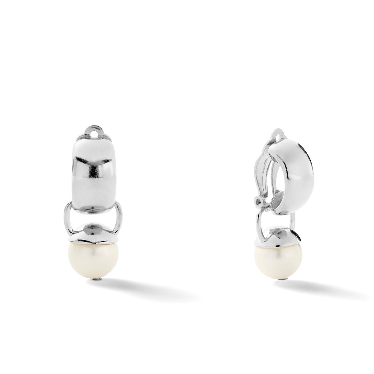 The image shows a pair of sterling silver ear clips with detachable white pearl drops. The ear clips have a smooth, sculpted design on top and a paddle backing.